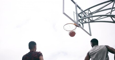 Poster - Basketball player winning sports game on court, playing in sport competition and training for exercise with friends. African man jumping to make goal and athletes winning match for professional club