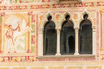 Wall Mural - Ancient Spilimbergo castle in Gothic-Renaissance style, medieval origins - XV century, main facade with numerous frescoes. Pordenone province, Friuli-Venezia Giulia, Italy, Europe.