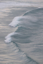 Waves Crashing On A Deserted Stretch Of Coastline