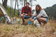 © Jacob Lund - Happy young couple camping in nature