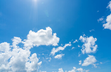 Wall Mural - blue sky and white clouds with sunlight on sunny day. world ozone day concept. blue sky background f
