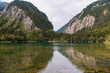 Horizontal panoramic image of the two mountains reflecting from the mirror surface of the emerald turquoise Five Color Pond lake in Jiuzhaigou, Aba Tibetan Autonomous Prefecture, Sichuan, China