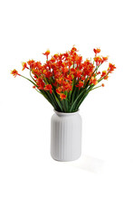 Close-up Shot Of A Bouquet Of Realistic Artificial Orchids In A White Vase. The Vase Of Orange Flowers Is Isolated On A White Background. Front View.