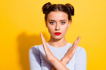 Wall Mural - Photo of strict lady crossing arms x sign blocking wrong danger way isolated vivid color background