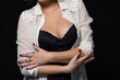 © Adam Radosavljevic - Provocative pose of young woman dresed in white shirt and black lingerie clothing