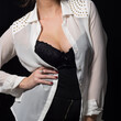 © Adam Radosavljevic - Provocative pose of young woman dresed in white shirt and black lingerie clothing