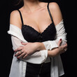 © Adam Radosavljevic - Provocative pose of young woman dresed in white shirt and black lingerie clothing