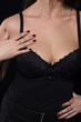 © Adam Radosavljevic - Seductive and provocative pose of young woman dresed in black lingerie clothing