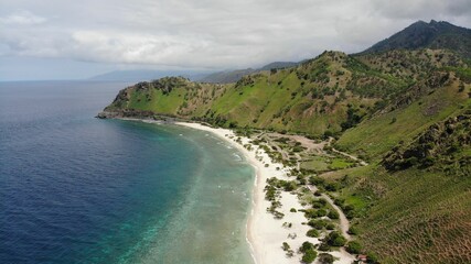 Canvas Print - Drone view of beautiful mountains near the sea in Dili, East Timor