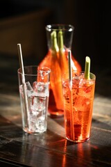 Poster - Closeup shot of shiny glass Bloody Mary cocktails on a wooden table