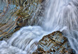 © ADDICTIVE STOCK - Waterfall on rough wet stones