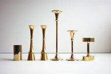 Brass Candle Holders In Mid Century Modern Design.