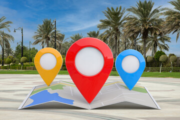Fototapete - Folded Abstract Navigation Map with Three Target Map Pointer Pins on an Empty City Street with Palm Trees. 3d Rendering