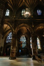 Interior View Of Saint Giles Cathedral With Colorful  Stained Glass Windows