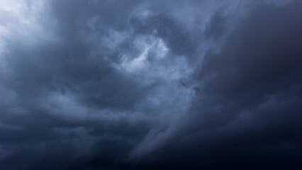 Aufkleber - The dark sky with heavy clouds converging and a violent storm before the rain.Bad or moody weather sky and environment. carbon dioxide emissions, greenhouse effect, global warming, climate change.