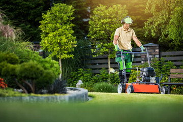 gardener mowing the lawn