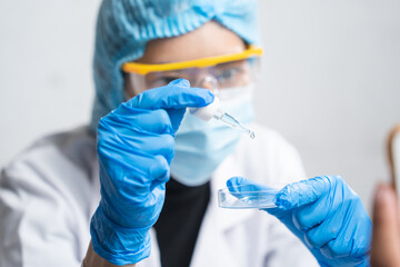 Wall Mural - blue chemical liquid experiment in scientific glassware equipment in science medicine laboratory, ch