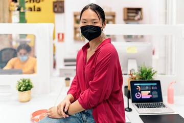 Wall Mural - Asian Office Worker with Face Mask