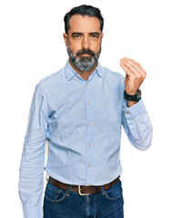 Wall Mural - Middle aged man with beard wearing business shirt doing italian gesture with hand and fingers confident expression