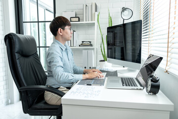 male programmer is programing to developing program app and website of corporate while working