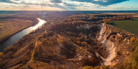 Sticker - Beautiful autumn photo of chalk quarry in the countryside. Drone shot of abandoned place for mining chalk near the river