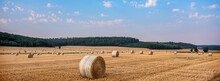 Lorraine Landscape In The North Of France With Straw Bales Under Blue Summer Sky