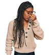 © Krakenimages.com - African american woman wearing casual clothes tired rubbing nose and eyes feeling fatigue and headache. stress and frustration concept.