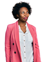 Poster - African american woman with afro hair wearing business jacket smiling looking to the side and staring away thinking.