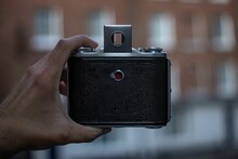 Holding Old Vintage Film Camera