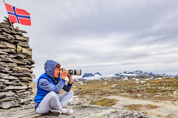 Sticker - Tourist with camera in Norway mountains