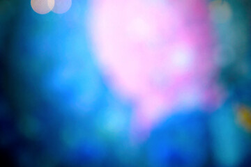 Wall Mural - blur colorful (blue, pink, green) light illuminated element at night, blur background