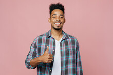 Young Smiling Happy Cheerful Man Of African American Ethnicity 20s He Wearing Blue Shirt Showing Thumb Up Like Gesture Isolated On Plain Pastel Light Pink Background Studio. People Lifestyle Concept.