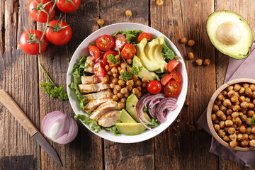 Wall Mural - buddha bowl- vegetable salad with grilled chicken sliced
