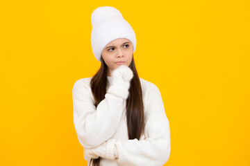 Beautiful teenager child 12, 13, 14 years old over isolated background with hand on chin thinking about question, thoughtful face. Doubt concept. Thinking teenager girl, thoughtful emotion