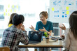 © crizzystudio - group of the business team meets to discuss plans to start a new business, accountant team manager having a discussion with new project success financial statistics
