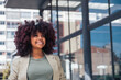 © ADDICTIVE STOCK - African American manager standing on street