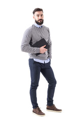 Handsome relaxed stylish bearded teacher with notebook looking at camera. Full body isolated on transparent background.