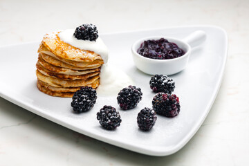 Wall Mural - pancakes with blackberries and cream