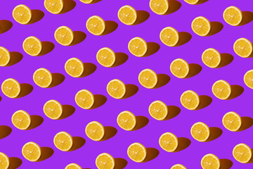 Wall Mural - Lemon pattern on purple background. Pop art design, creative citruses. Yellow lemon, minimal flat style.