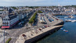 Aerial view of Concarneau, a medieval walled city in Brittany, France - Embankment with a modern parking and a carrousel