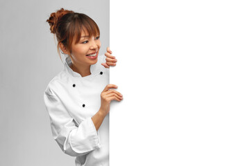 Sticker - cooking, advertisement and people concept - happy smiling female chef with white board over grey background