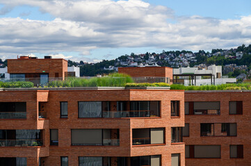 Modern brick building with rooftop garden, Oslo, Norway
