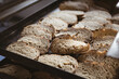 © Wavebreak Media - Close-up of bread slices in baking tray at bakery