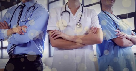 Sticker - Animation of caucasian doctors over spots