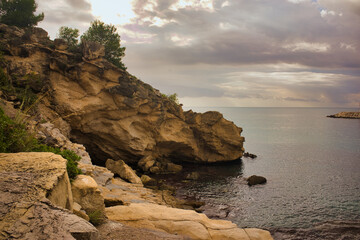 Wall Mural - The coast of Moraira a cloudy day by the sea