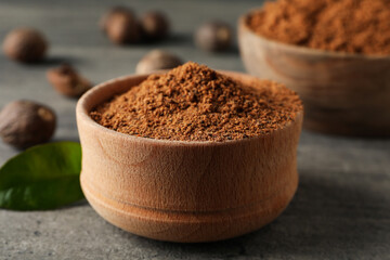 Poster - Concept of spices and condiments, nutmeg powder, close up