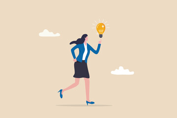 Businesswoman thinking about idea, solution or strategy planning, career or occupation, expertise or professional to solve problem concept, cheerful businesswoman got new idea lightbulb in her hand.