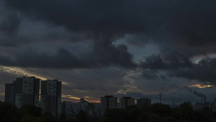 Wall Mural - Storm clouds on sunset, dramatic sky, time lapse.
