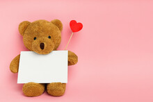 Cute Teddy Bear With Red Heart And Blank Card On Pink Background, Space For Text. Valentine's Day Celebration
