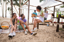 Full Body Photo Of Group Friendly Positive People Enjoy Hanging Out Sand Beach Party Chatting Communicate Outdoors